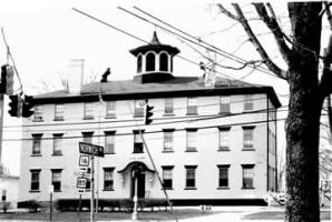 Black and White photo of large 3 story building