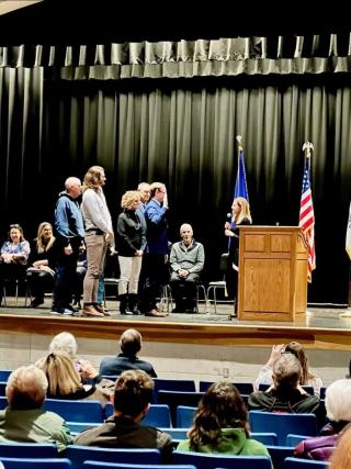 Bernie Dennler is sworn-in as First Selectman of Colchester at Bacon Academy's auditorium on November 19, 2023