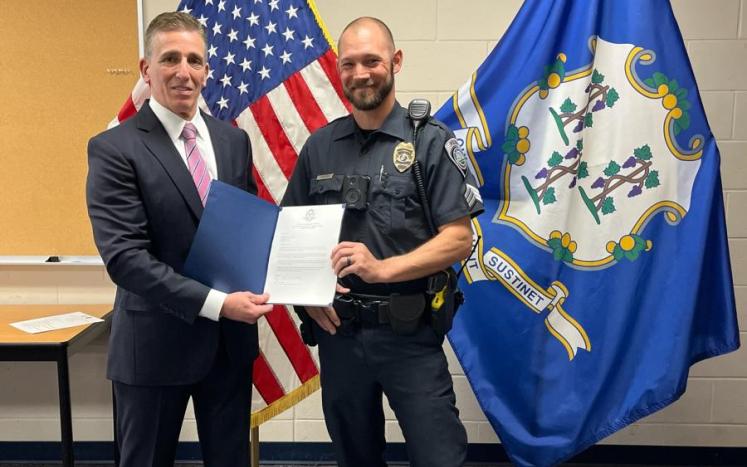 Sgt. Adam Regnere receives Colchester Police's State Tier 1 Accreditation